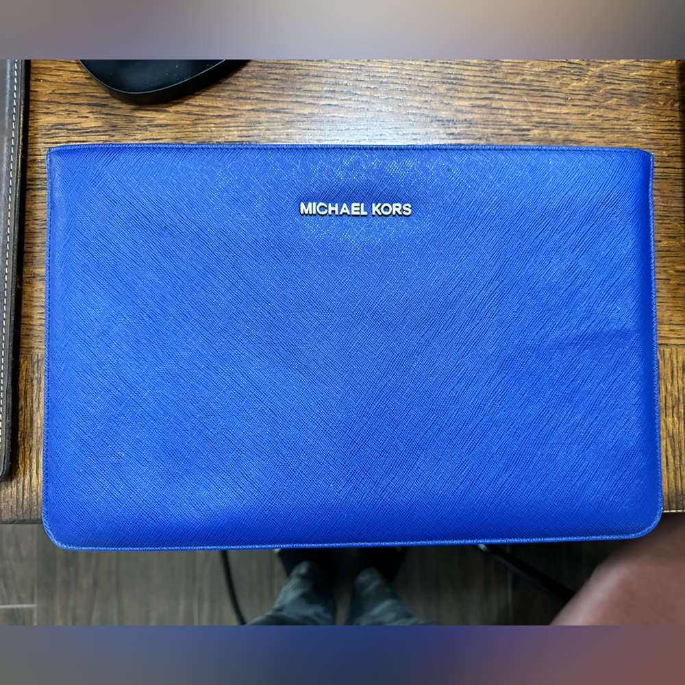 Micheal Kors computer sleeve for 11.6 inch size computer.